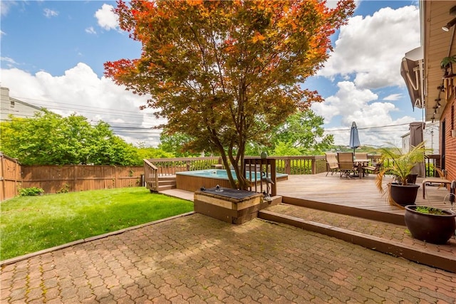 view of patio featuring outdoor dining area and a wooden deck