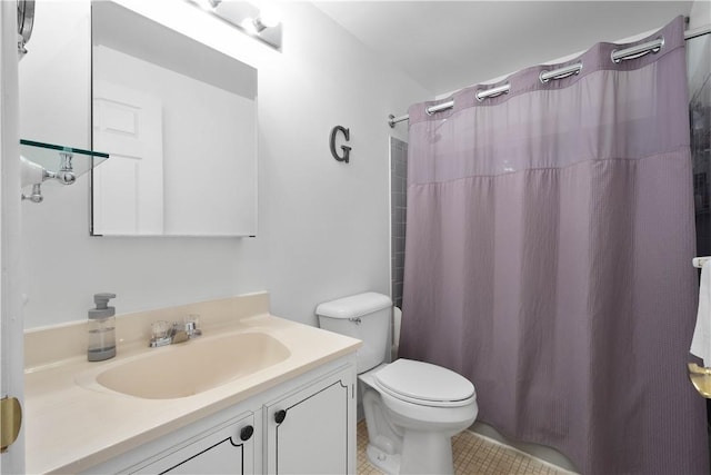 full bathroom featuring vanity, toilet, curtained shower, and tile patterned floors