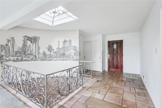 46 Churchill Rd, Churchill Boro, PA 15235 - entryway with a skylight, stone tile flooring, and baseboards