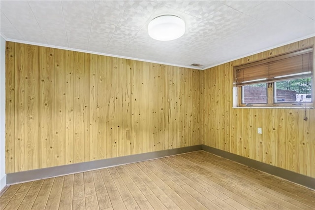 46 Churchill Rd, Churchill Boro, PA 15235 - unfurnished room featuring wood finished floors, wood walls, and baseboards