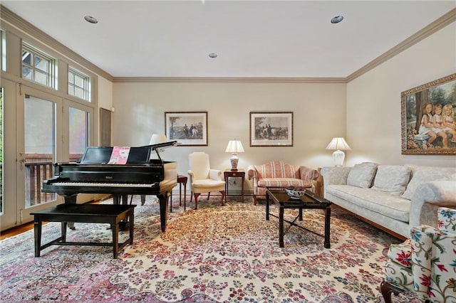 living room with crown molding and wood finished floors