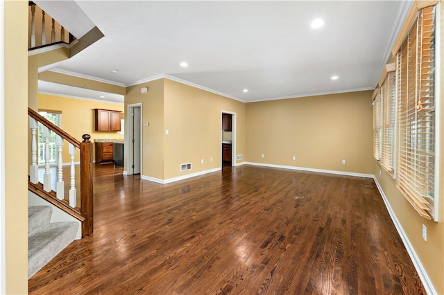 unfurnished living room with dark wood-style flooring, baseboards, recessed lighting, stairway, and crown molding