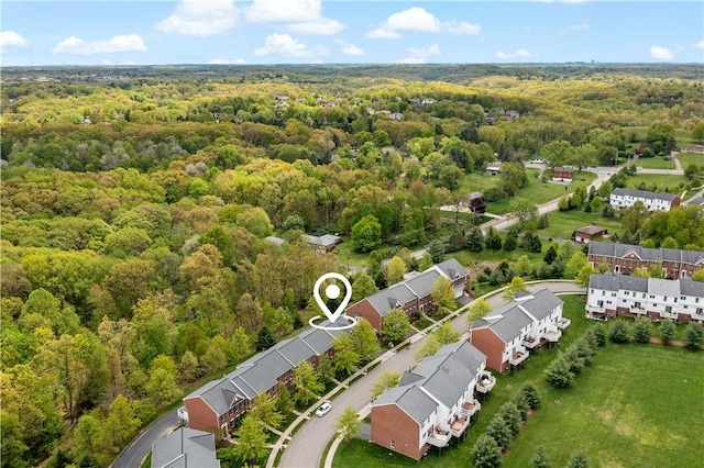 drone / aerial view of a heavily wooded area