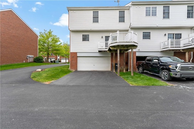 391 Marshall Heights Dr, Marshall, PA 15090 - view of front of property featuring an attached garage, asphalt driveway, and brick siding