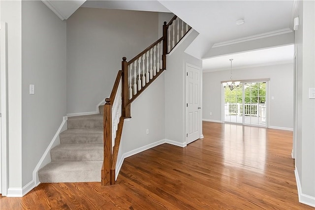 391 Marshall Heights Dr, Marshall, PA 15090 - staircase with a chandelier, wood finished floors, and ornamental molding