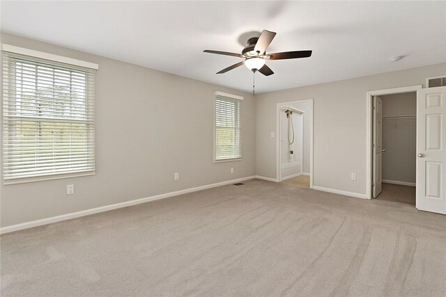 391 Marshall Heights Dr, Marshall, PA 15090 - unfurnished bedroom with light carpet, a spacious closet, a ceiling fan, and a closet