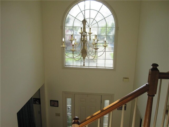 106 Conestoga Dr, Peters Twp, PA 15367 - foyer with plenty of natural light, a chandelier, and stairway