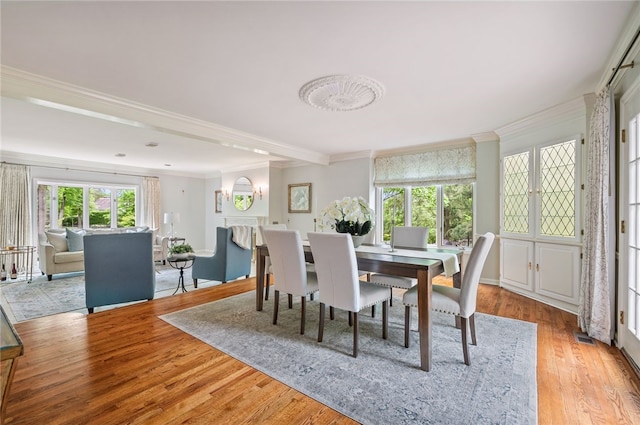 1 Way Hollow Rd, Edgeworth, PA 15143 - dining room featuring healthy amount of natural light, crown molding, and wood finished floors