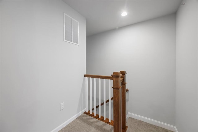 staircase with baseboards, carpet, and recessed lighting