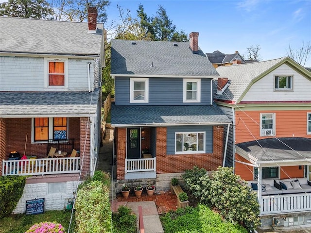 432 Iberia St, Mt Washington, PA 15211 - view of front of property with a porch, a chimney, brick siding, and a shingled roof