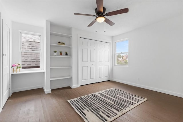 432 Iberia St, Mt Washington, PA 15211 - unfurnished bedroom featuring baseboards, hardwood / wood-style flooring, a closet, and ceiling fan
