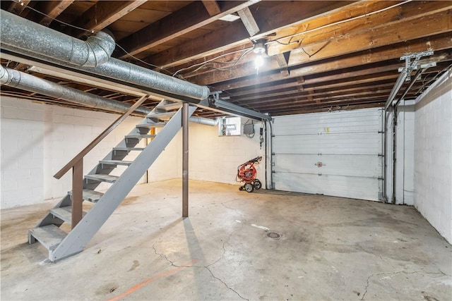 garage with concrete block wall