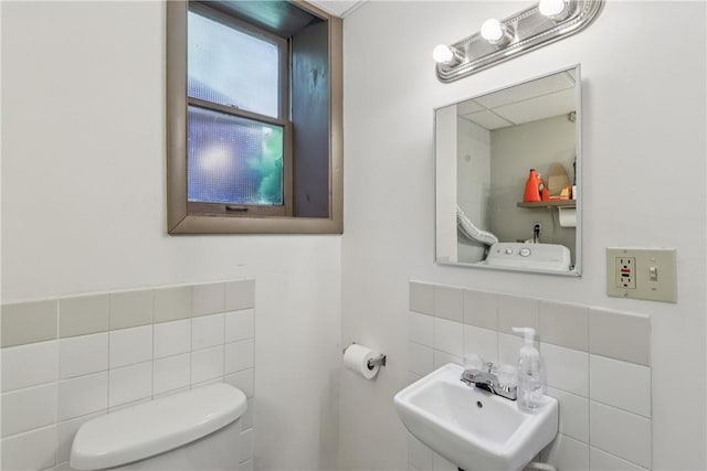 550 Mcclane Farm Rd, Chartiers, PA 15301 - half bathroom with tile walls, a sink, toilet, and decorative backsplash