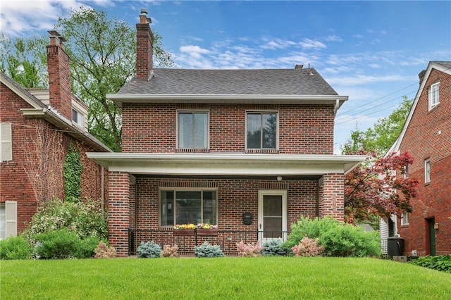 6640 Wilkins Ave, Squirrel Hill, PA 15217 - traditional style home featuring brick siding, a front yard, and roof with shingles