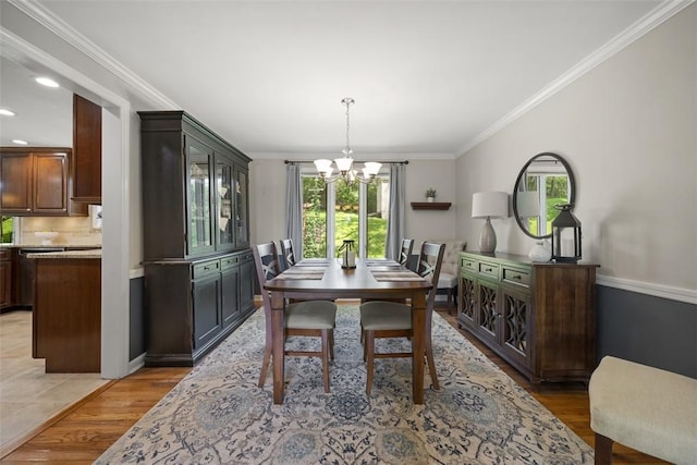 1805 Taper Dr, Upper St Clair, PA 15241 - dining space with a chandelier, crown molding, light wood-style floors, recessed lighting, and baseboards