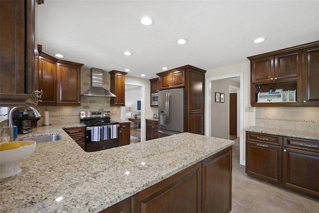 1805 Taper Dr, Upper St Clair, PA 15241 - kitchen with wall chimney range hood, appliances with stainless steel finishes, a sink, backsplash, and light stone counters