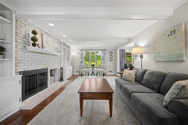 1805 Taper Dr, Upper St Clair, PA 15241 - living room with beamed ceiling, dark wood-type flooring, a brick fireplace, ornamental molding, and recessed lighting