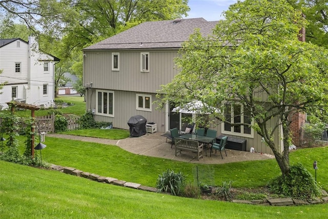 1805 Taper Dr, Upper St Clair, PA 15241 - back of house with a patio area, a yard, and a shingled roof