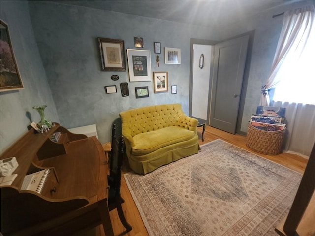 living area with wood finished floors