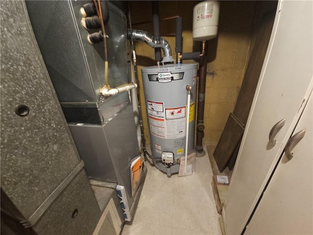 utility room with water heater and heating unit