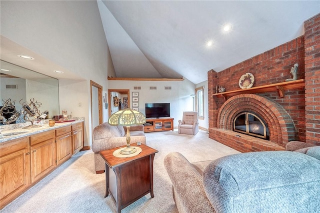 living room featuring light carpet, high vaulted ceiling, a fireplace, and recessed lighting