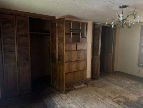 543 Highland Ave, Kittanning Boro, PA 16201 - unfurnished bedroom featuring wood finished floors and baseboards