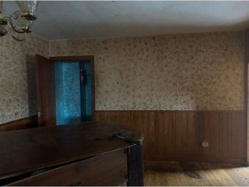 543 Highland Ave, Kittanning Boro, PA 16201 - unfurnished dining area with a wainscoted wall, light wood-type flooring, wooden walls, and wallpapered walls