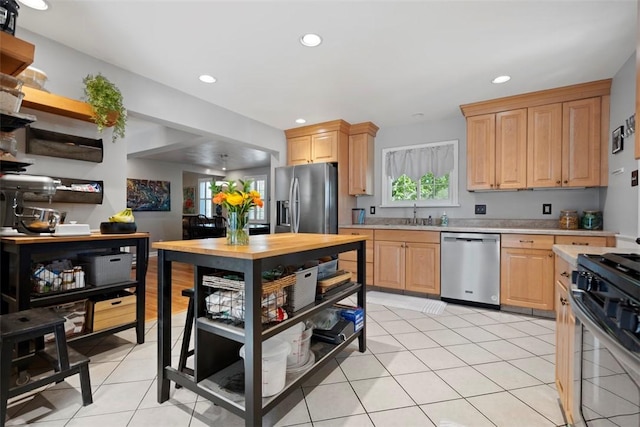 701 Thorn St, Sewickley, PA 15143 - kitchen featuring stainless steel appliances, light countertops, light brown cabinetry, plenty of natural light, and recessed lighting