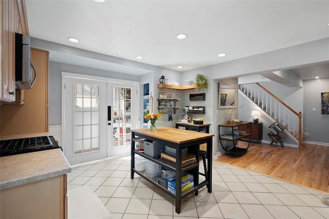 701 Thorn St, Sewickley, PA 15143 - dining room with stairs, french doors, light tile patterned floors, and recessed lighting