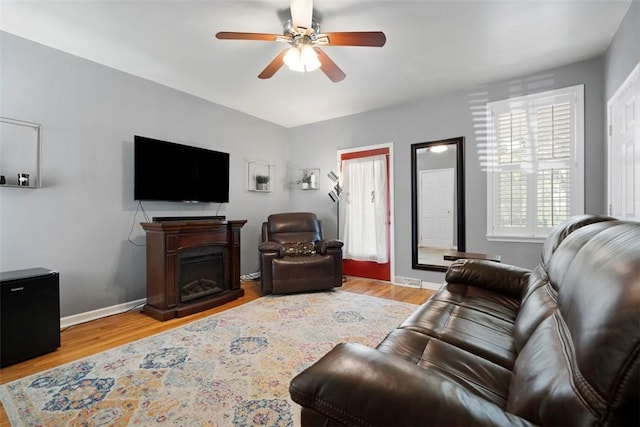 701 Thorn St, Sewickley, PA 15143 - living area featuring ceiling fan, wood finished floors, a fireplace, and baseboards