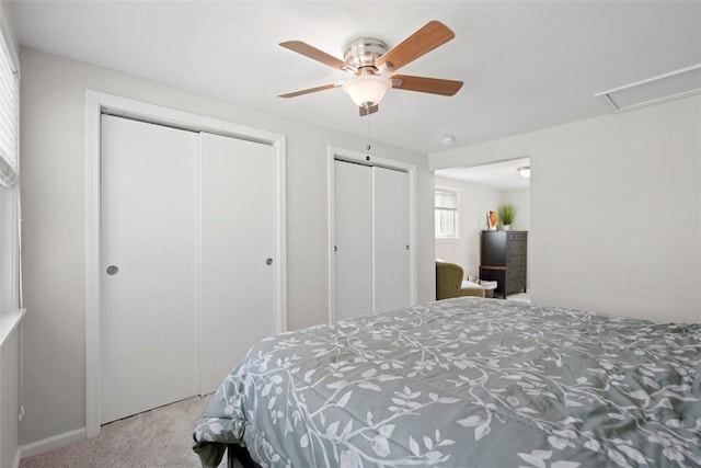 701 Thorn St, Sewickley, PA 15143 - bedroom featuring carpet, multiple closets, and ceiling fan