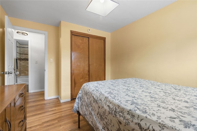 187 Anderson Rd, North Huntingdon, PA 15642 - bedroom featuring light wood-style floors, baseboards, and a closet