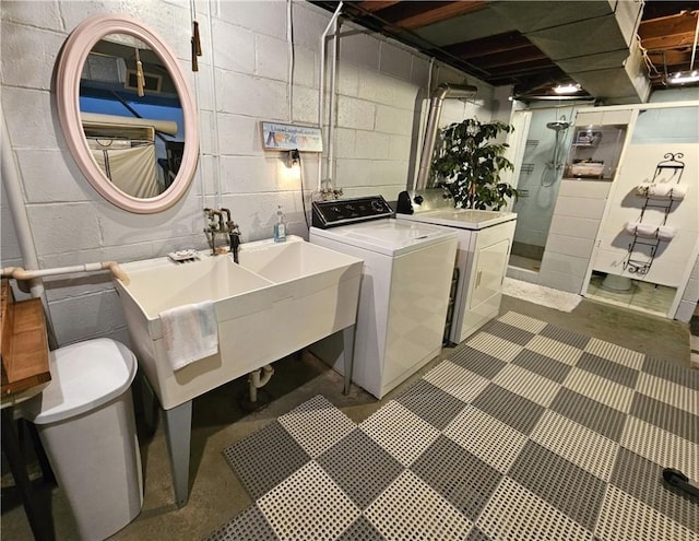 washroom with concrete block wall