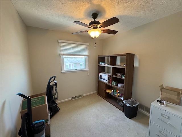 109 Canterbury Commons Unit 109, White Twp Ind, PA 15701 - office space featuring a ceiling fan, a textured ceiling, carpet floors, and baseboards