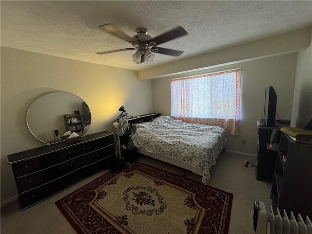 109 Canterbury Commons Unit 109, White Twp Ind, PA 15701 - carpeted bedroom featuring a textured ceiling and ceiling fan