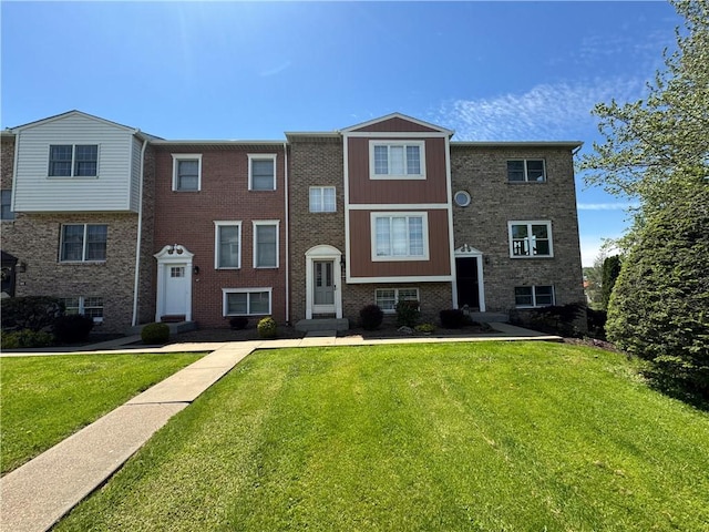 109 Canterbury Commons Unit 109, White Twp Ind, PA 15701 - view of front of home with a front yard and brick siding