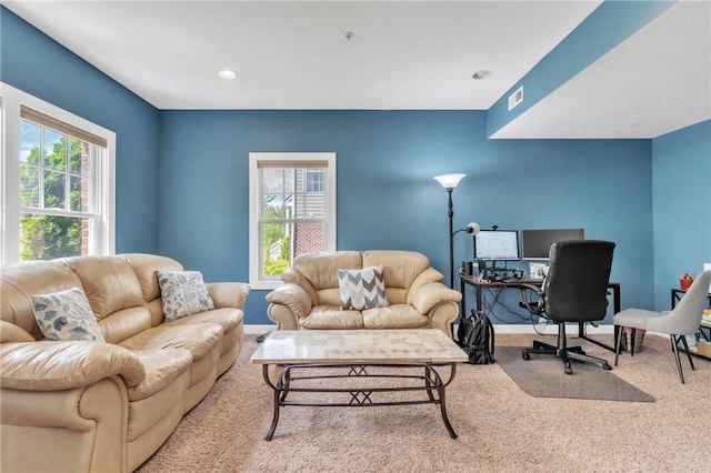 living room with carpet flooring and recessed lighting