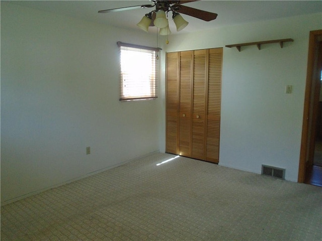 1040 Catherine Dr, Conway, PA 15027 - unfurnished bedroom with carpet flooring, a closet, and a ceiling fan