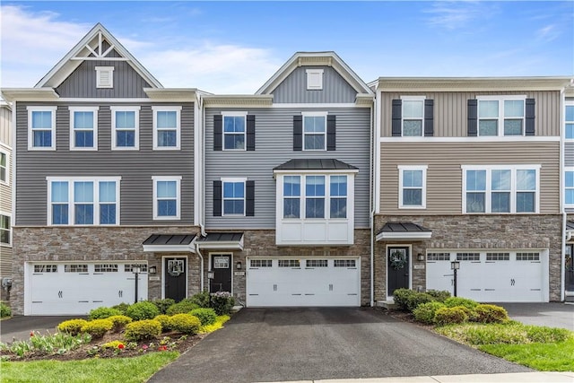 4012 Crown Dr, South Park, PA 15129 - view of property featuring stone siding, board and batten siding, and driveway