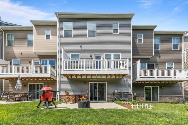 4012 Crown Dr, South Park, PA 15129 - rear view of property featuring a lawn, a patio, stone siding, and central AC unit