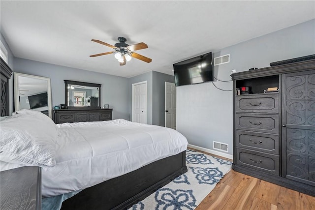 2939 Main St, Beallsville, PA 15313 - bedroom with light wood-style floors, baseboards, a ceiling fan, and a closet
