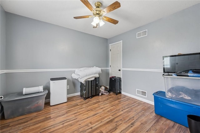 2939 Main St, Beallsville, PA 15313 - miscellaneous room featuring wood finished floors, baseboards, and a ceiling fan