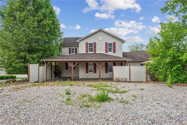 2939 Main St, Beallsville, PA 15313 - country-style home featuring fence, a porch, and roof with shingles