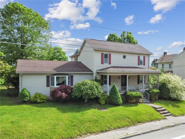 2939 Main St, Beallsville, PA 15313 - view of front facade with covered porch and a front lawn