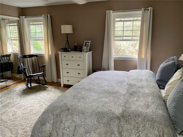 bedroom featuring wood finished floors