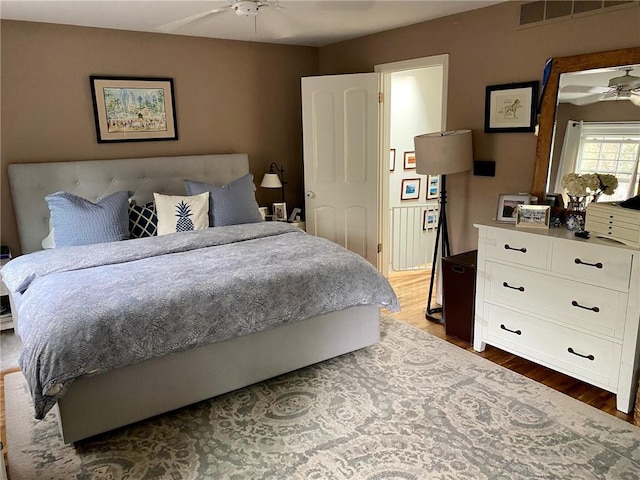 bedroom with wood finished floors