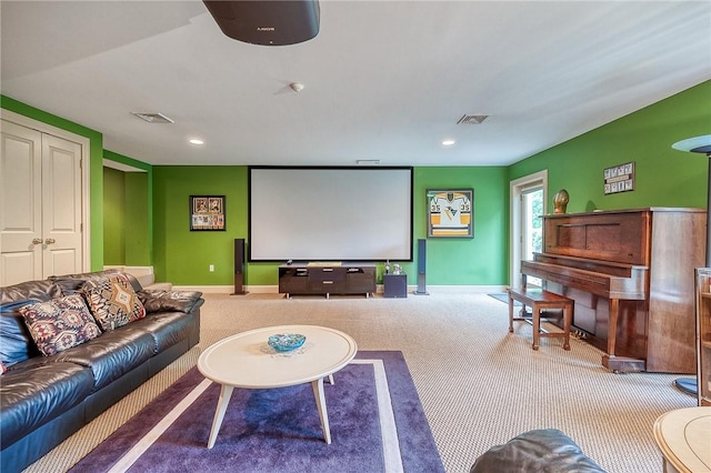 carpeted cinema featuring baseboards and recessed lighting