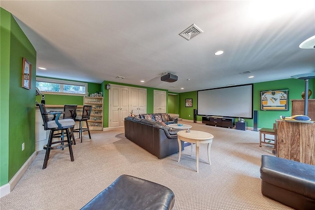 cinema room featuring carpet, recessed lighting, and baseboards