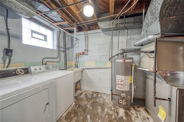 1593 Riverside Dr, Penn Hills, PA 15147 - clothes washing area with gas water heater and independent washer and dryer