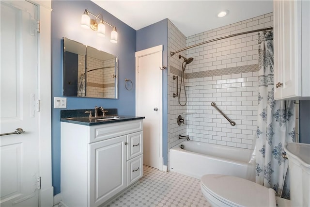 full bathroom with shower / bathtub combination with curtain, tile patterned floors, toilet, and vanity